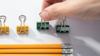 A patient with OCD arranging office supplies to be aligned perfectly.
